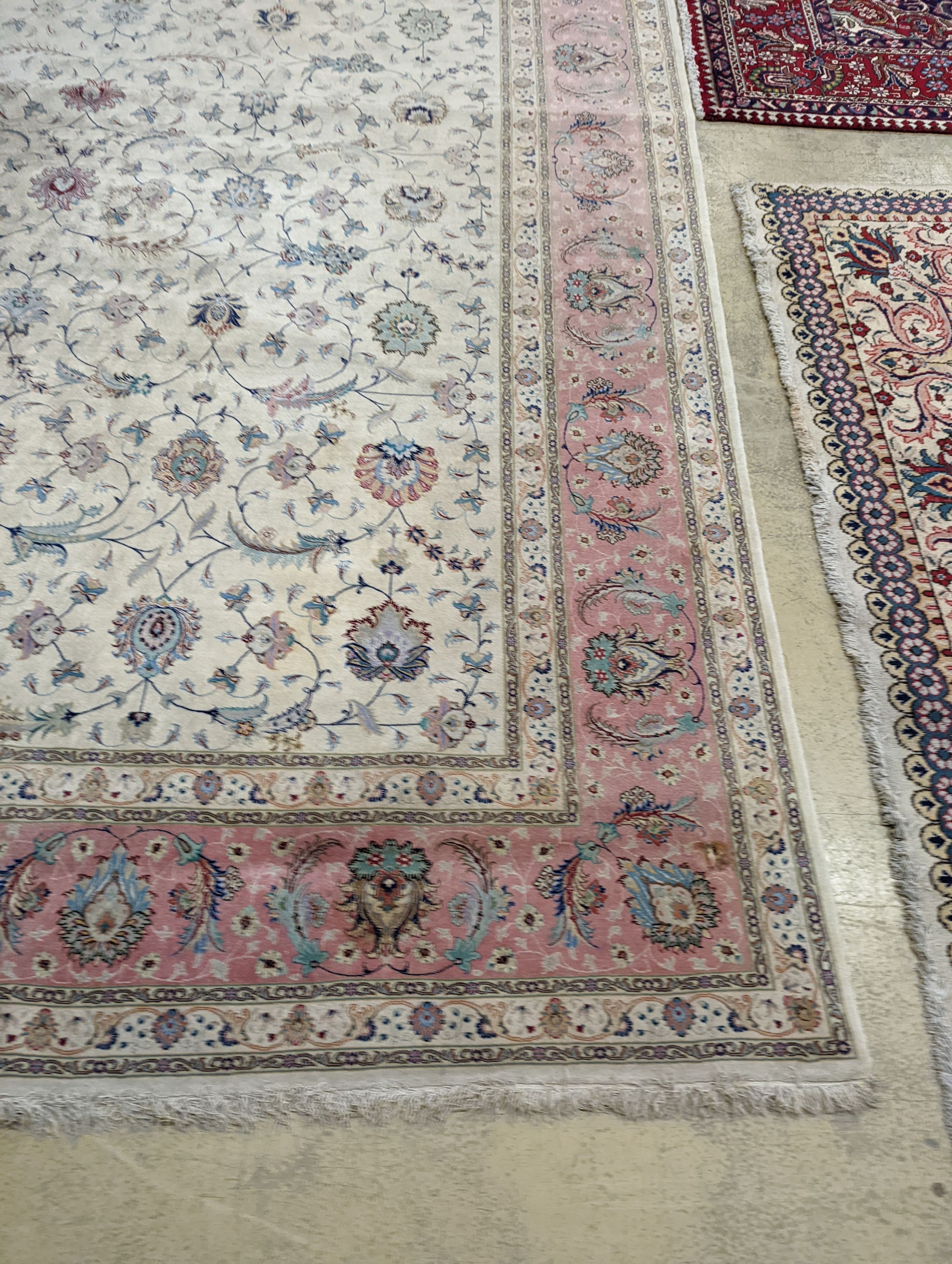 A Persian Tabriz ivory ground carpet, 410 x 300